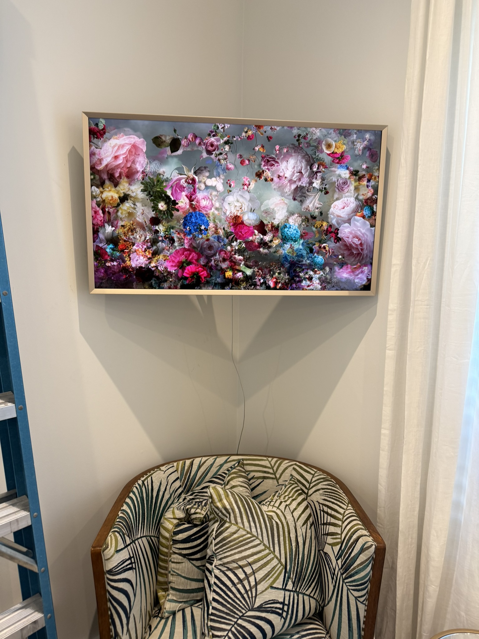 Frame TV mounted in a corner
